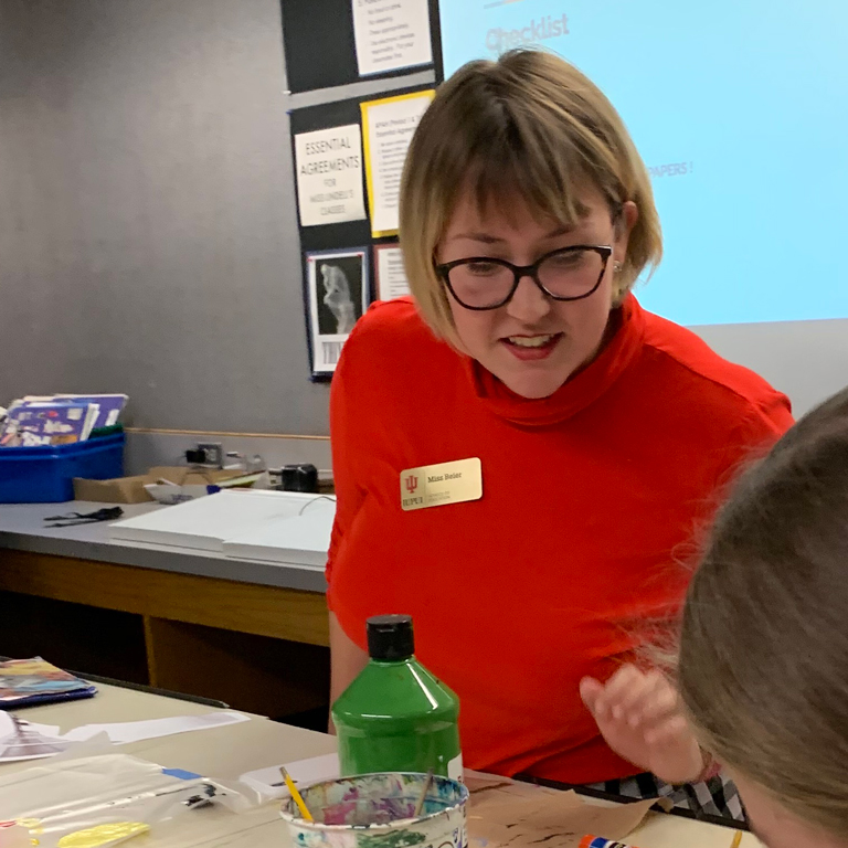 Rachel Beier teaching in a classroom during a practicum experience.